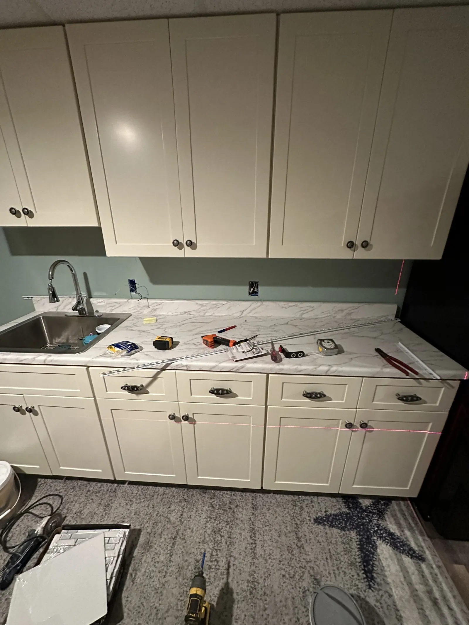 Kitchen cabinets and countertop mid-install