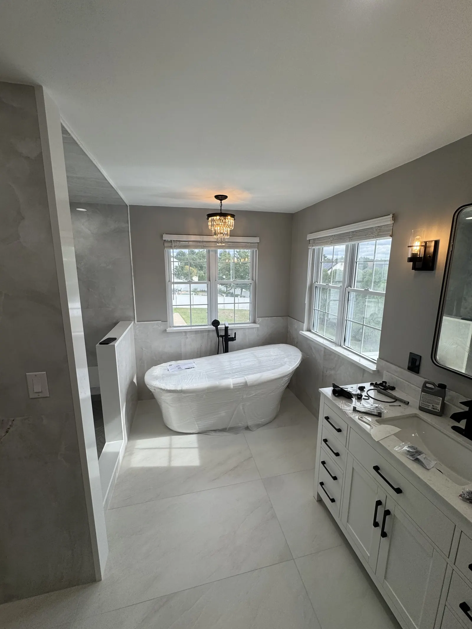 Finished bathroom with freestanding tub